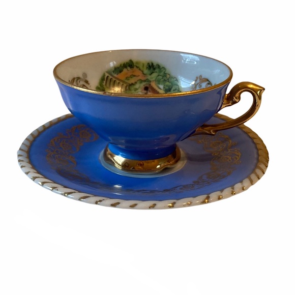 Vintage blue German plated 24 karat gold teacup and saucer